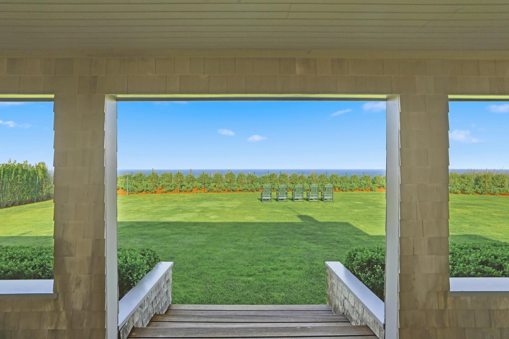 59 Baxter Road Nantucket, MA 02554 - Photo 4 of 8 a view of a city from a balcony