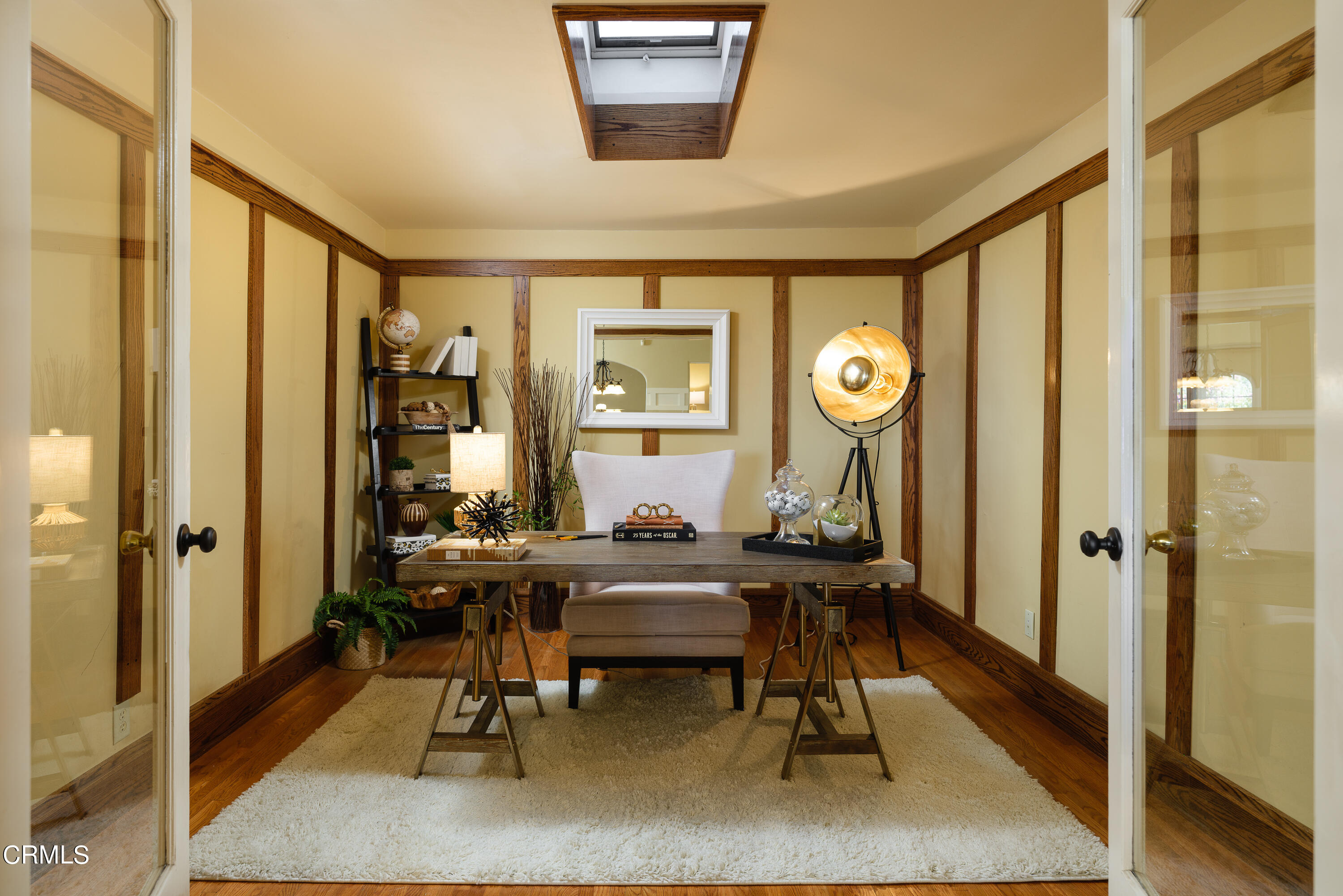 981 Parkman Street Altadena, CA 91001 - Photo 18 of 75 a living room with furniture a window and a painting on the wall