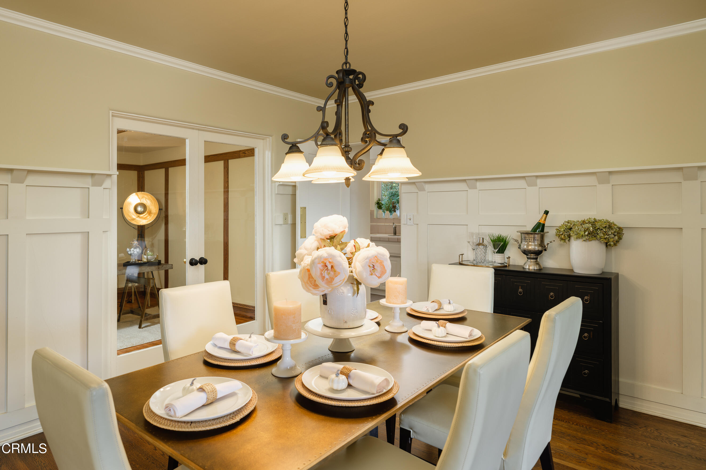 981 Parkman Street Altadena, CA 91001 - Photo 20 of 75 a dining room with furniture a chandelier and wooden floor
