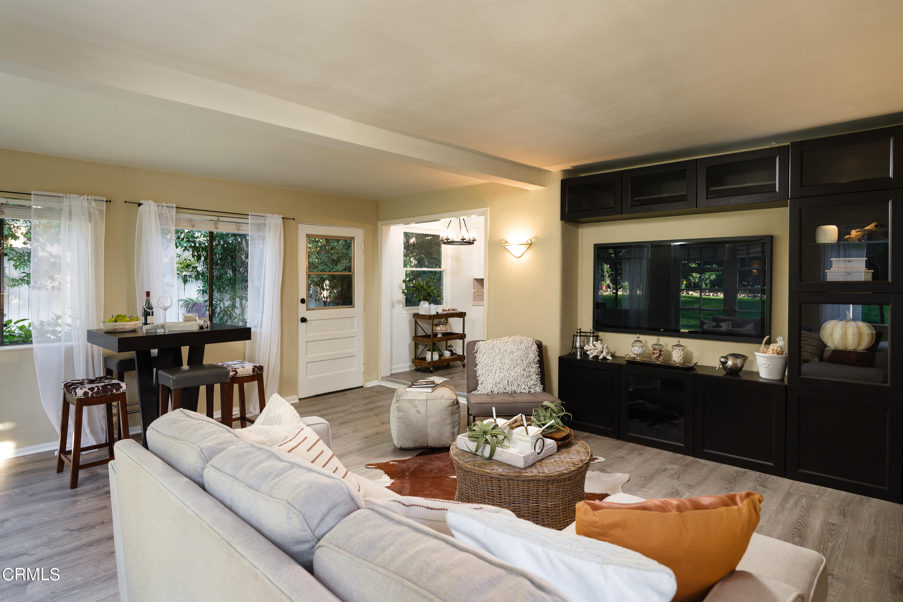981 Parkman Street Altadena, CA 91001 - Photo 27 of 75 a living room with furniture and a large window