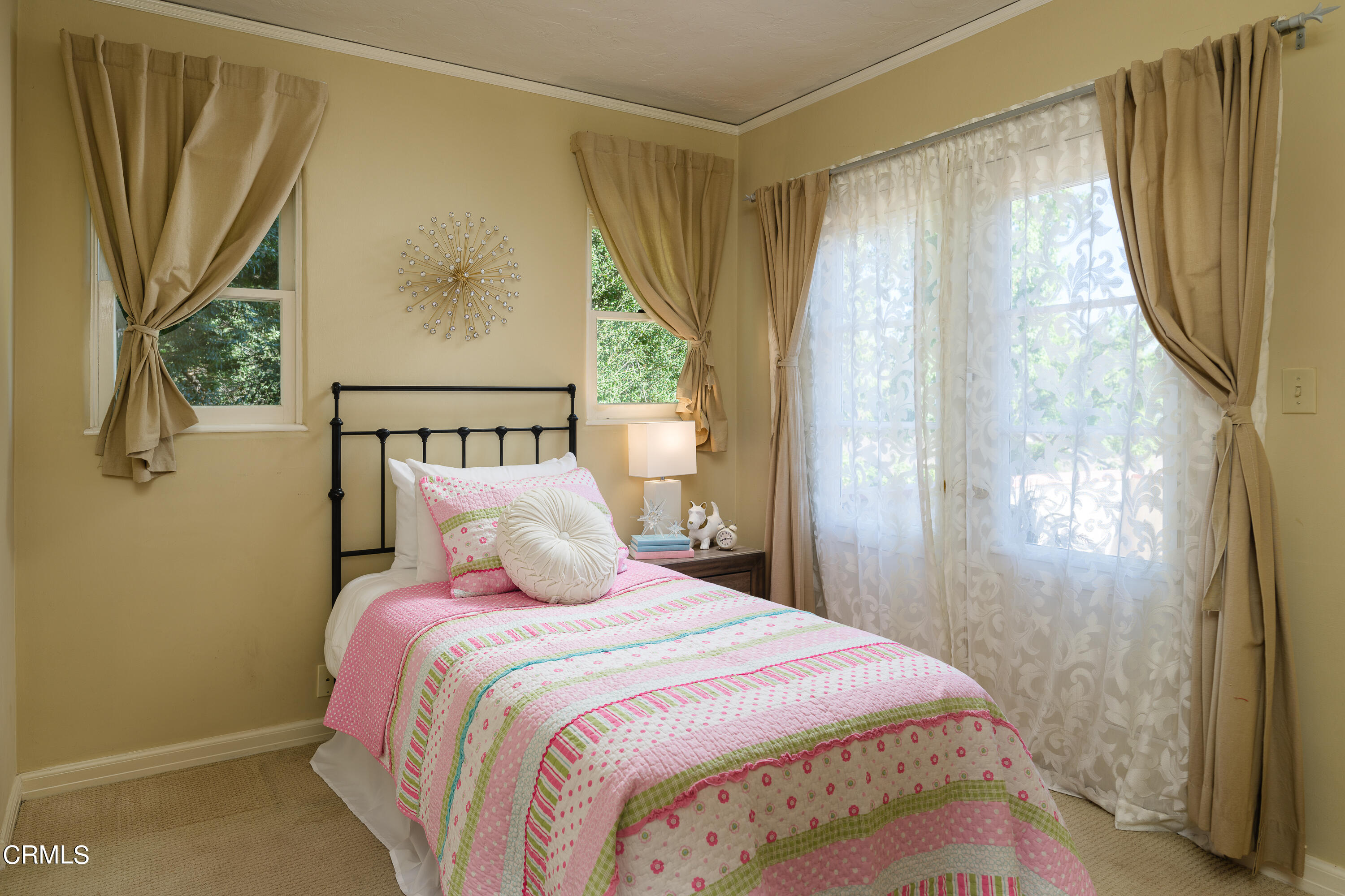 981 Parkman Street Altadena, CA 91001 - Photo 28 of 75 a bedroom with a bed and a window