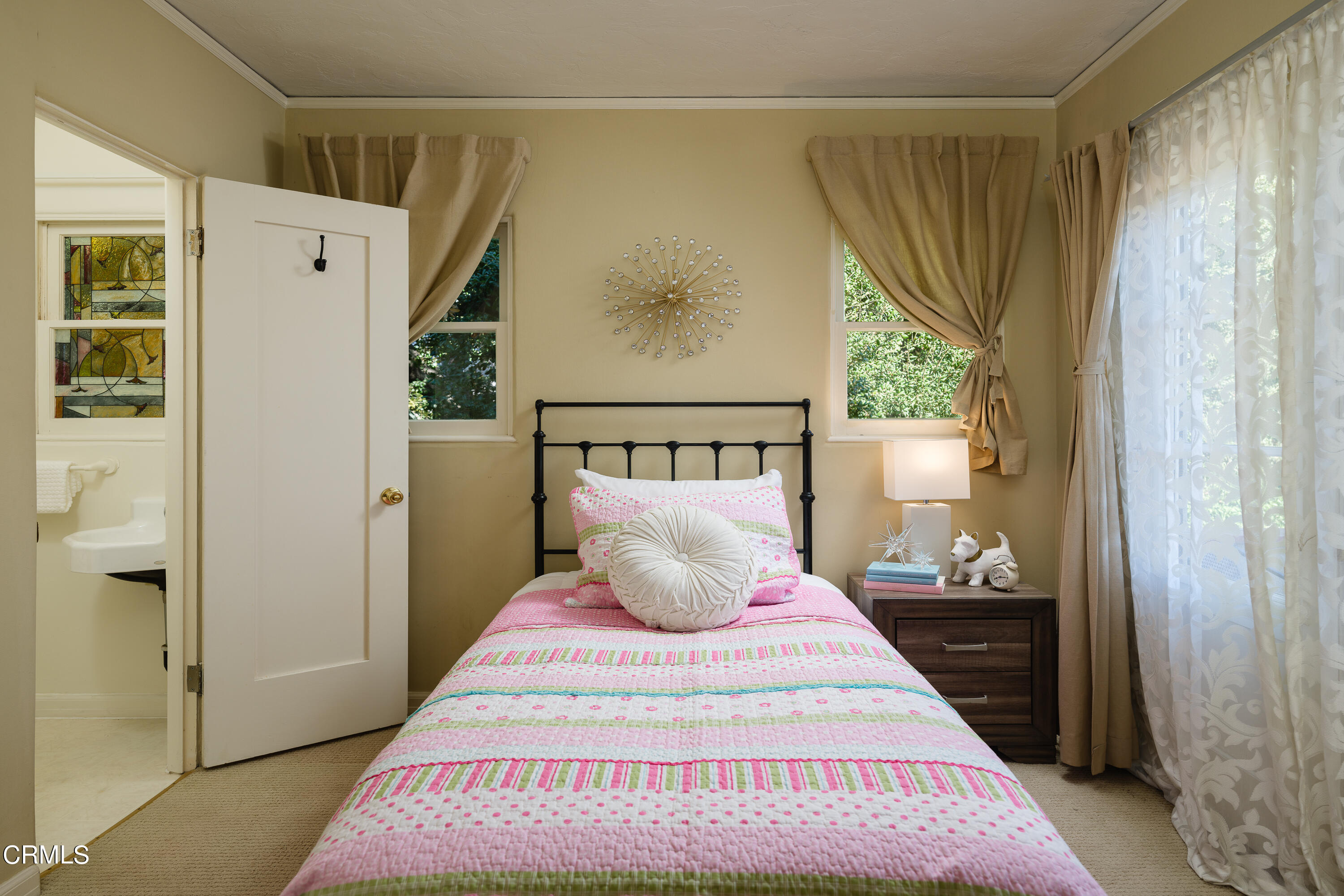 981 Parkman Street Altadena, CA 91001 - Photo 30 of 75 a bedroom with a bed and wooden floor