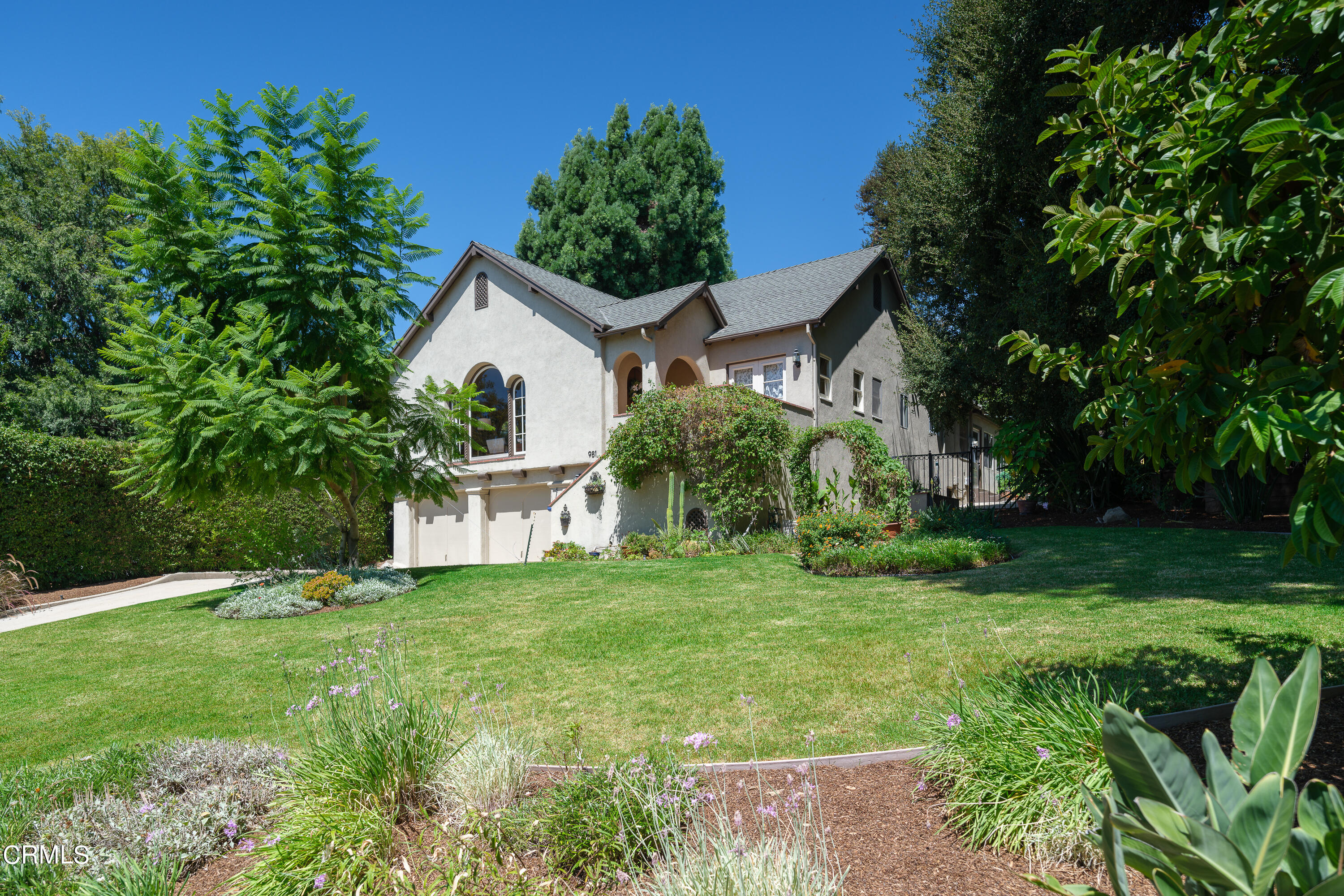 981 Parkman Street Altadena, CA 91001 - Photo 3 of 75 a front view of a house with yard and green space