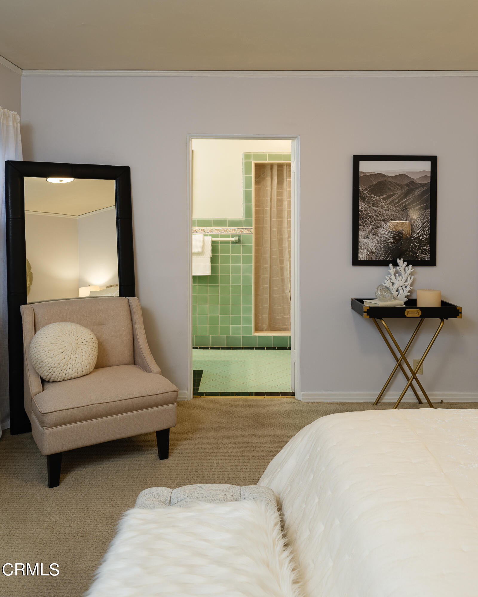 981 Parkman Street Altadena, CA 91001 - Photo 34 of 75 a bedroom with a bed a mirror and a lamp on dresser