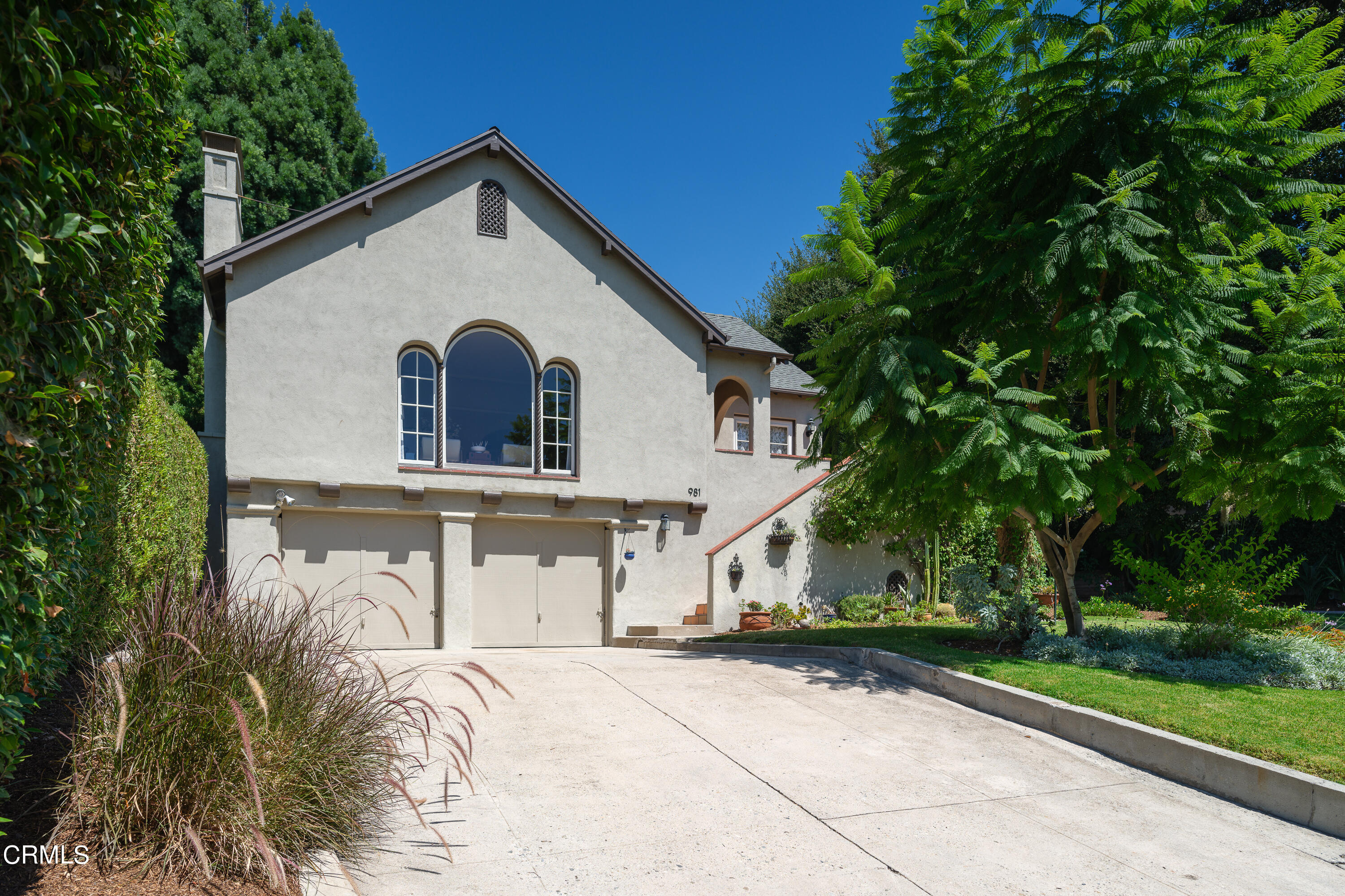 981 Parkman Street Altadena, CA 91001 - Photo 4 of 75 a front view of a house with a yard