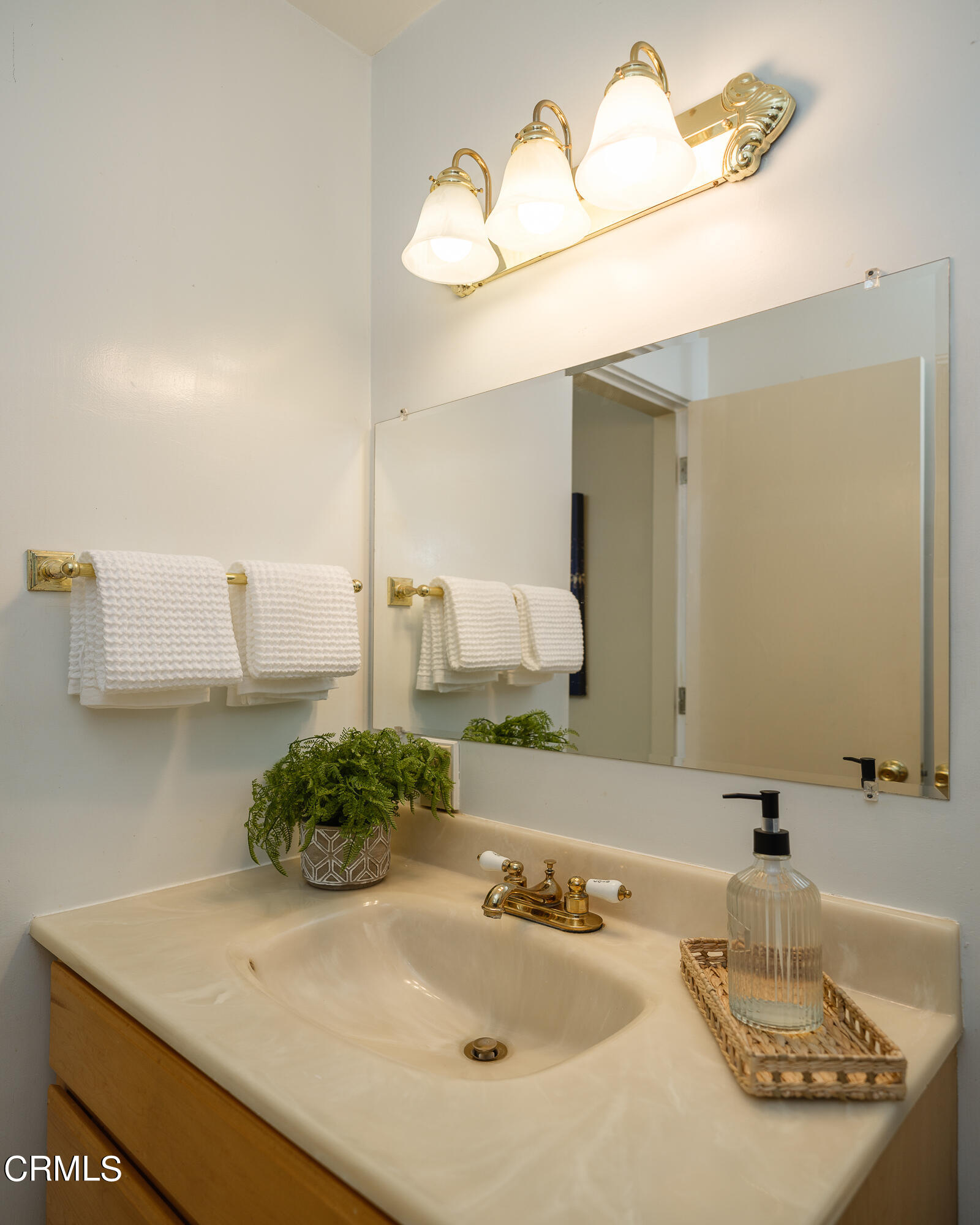981 Parkman Street Altadena, CA 91001 - Photo 43 of 75 a bathroom with a sink and a mirror