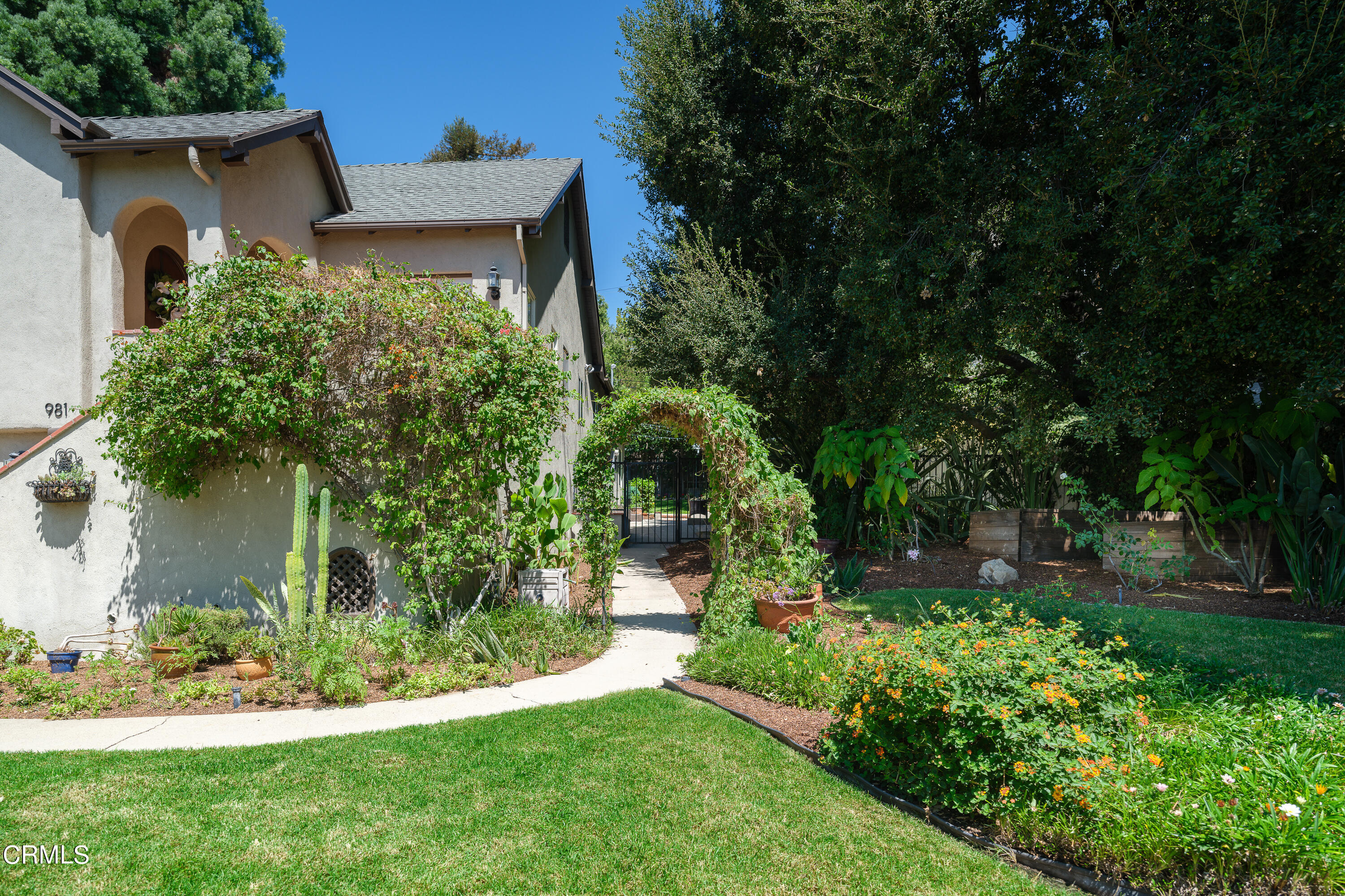 981 Parkman Street Altadena, CA 91001 - Photo 51 of 75 a front view of a house with a yard