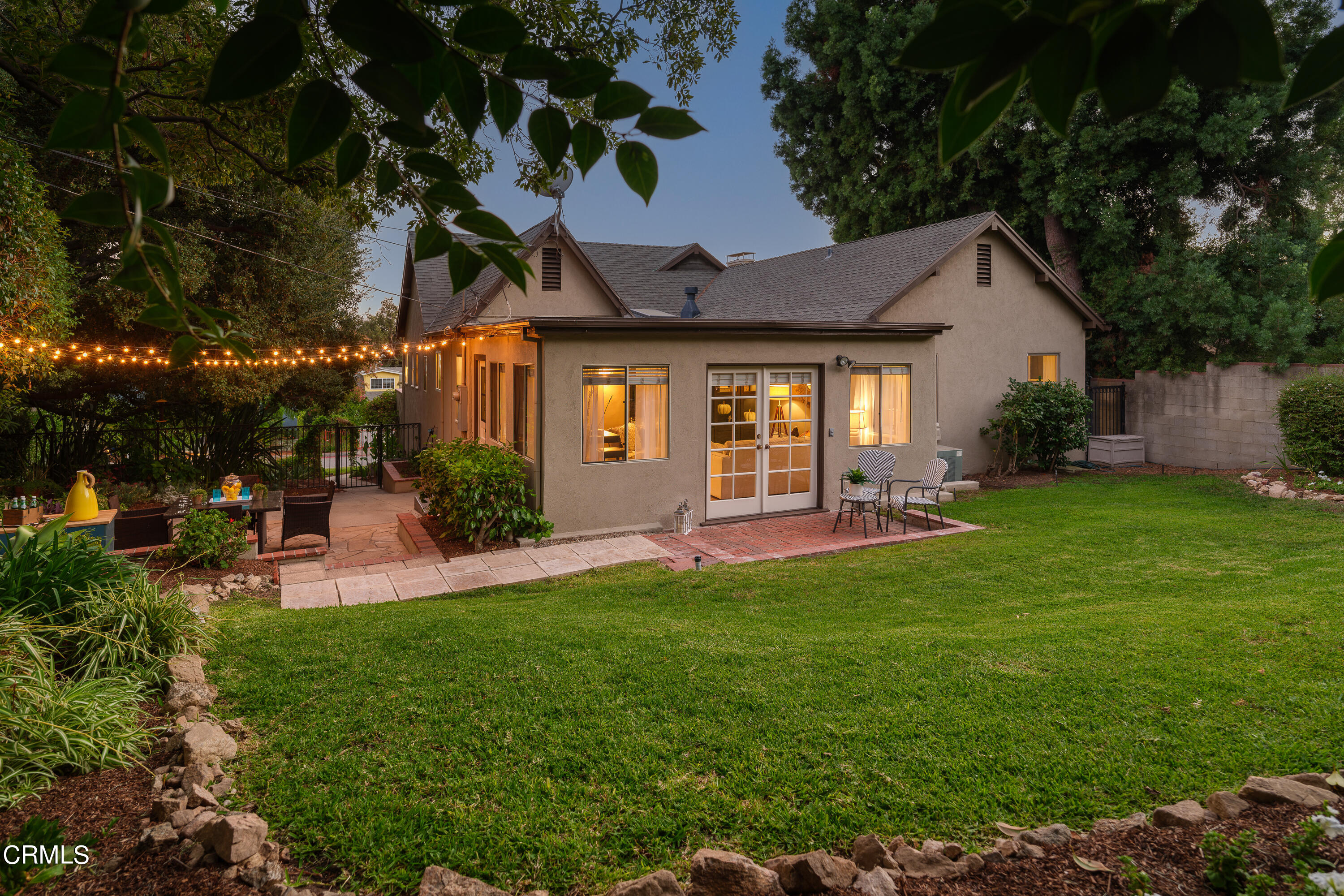981 Parkman Street Altadena, CA 91001 - Photo 75 of 75 a front view of a house with a yard and porch