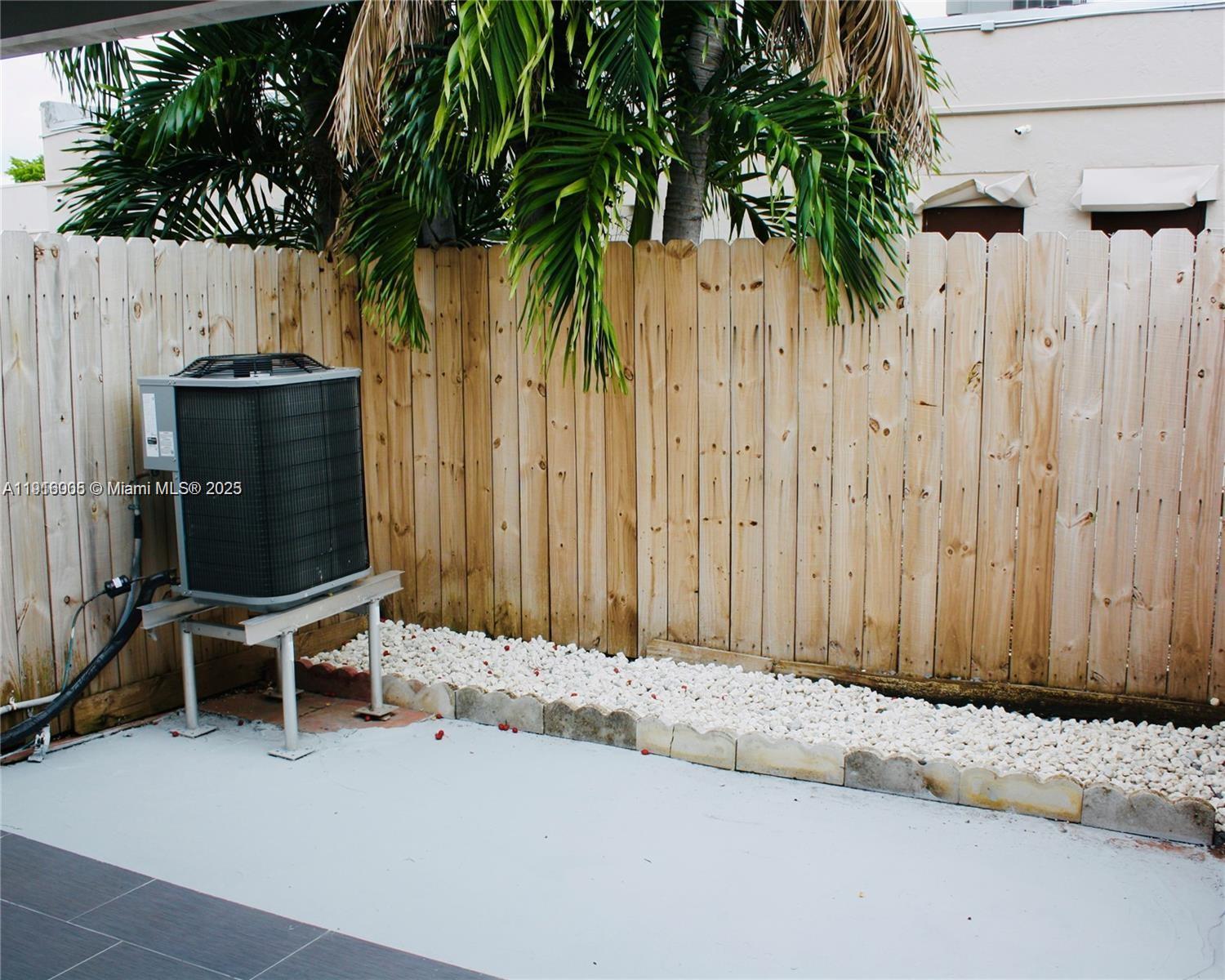 2079 West 54th Terrace, Unit 29 Hialeah, FL 33016 - Photo 3 of 43 a view of outdoor space with chairs