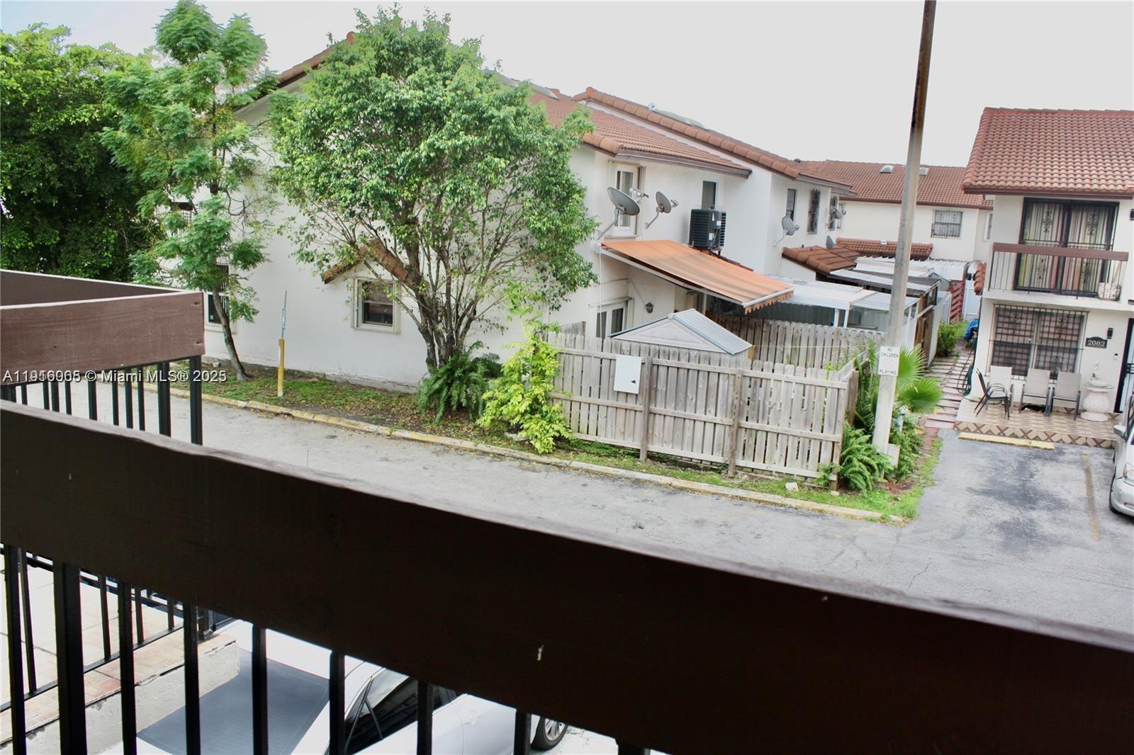 2079 West 54th Terrace, Unit 29 Hialeah, FL 33016 - Photo 37 of 43 a house view with a outdoor space