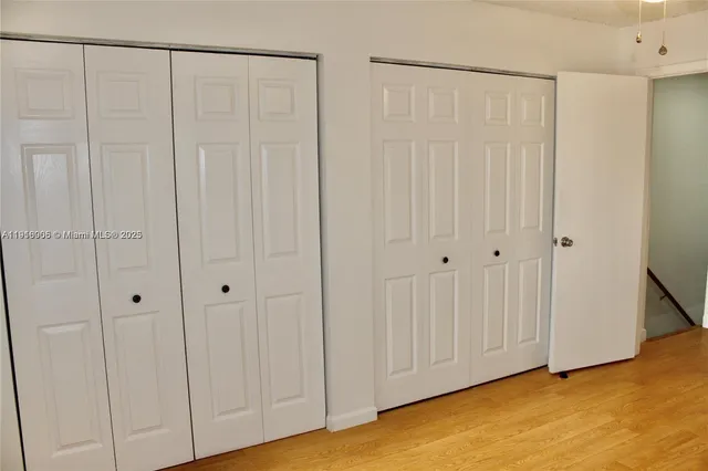a view of a livingroom with wooden floor
