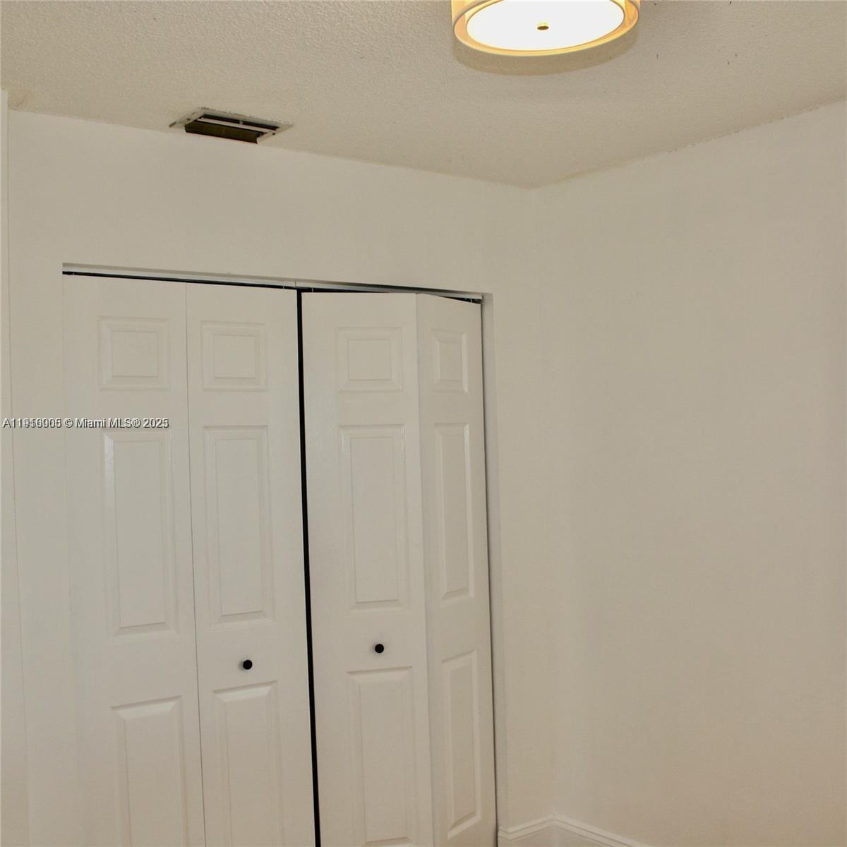 2079 West 54th Terrace, Unit 29 Hialeah, FL 33016 - Photo 40 of 43 a bathroom with a shower