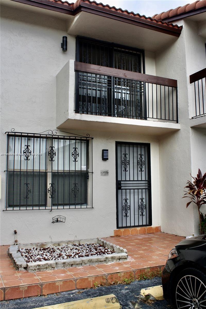 2079 West 54th Terrace, Unit 29 Hialeah, FL 33016 - Photo 42 of 43 a view of front door