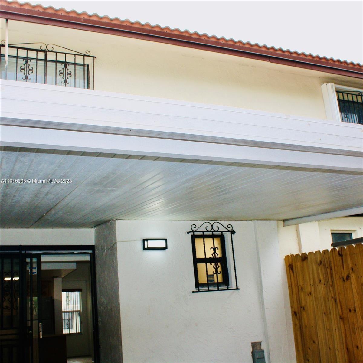 2079 West 54th Terrace, Unit 29 Hialeah, FL 33016 - Photo 7 of 43 a view of a living room and entryway