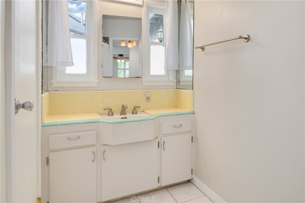 234 North Martha Place Fullerton, CA 92833 - Photo 19 of 46 a bathroom with a sink and a mirror