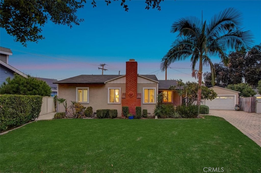 234 North Martha Place Fullerton, CA 92833 - Photo 2 of 46 a front view of a house with garden