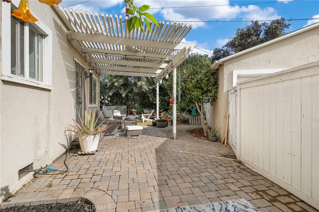 234 North Martha Place Fullerton, CA 92833 - Photo 27 of 46 a view of a porch with chairs and potted plants