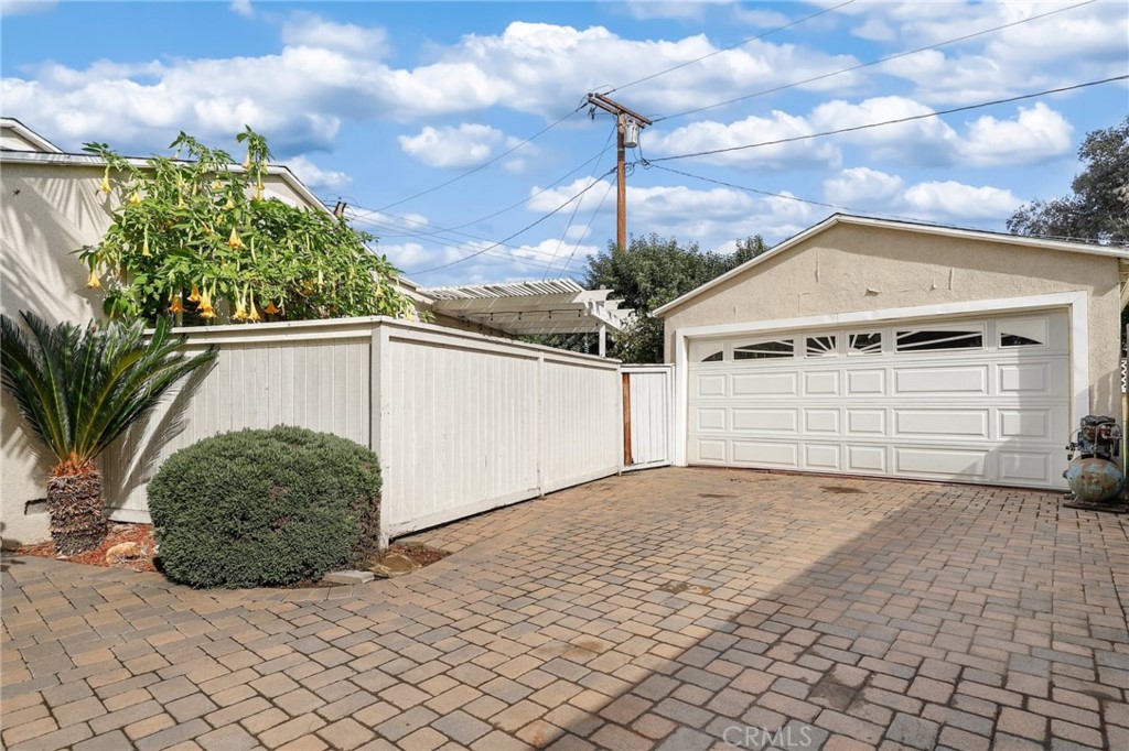 234 North Martha Place Fullerton, CA 92833 - Photo 28 of 46 a front view of a house with a garage