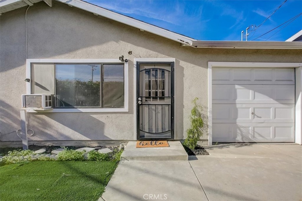 234 North Martha Place Fullerton, CA 92833 - Photo 32 of 46 a front view of a house with a garden