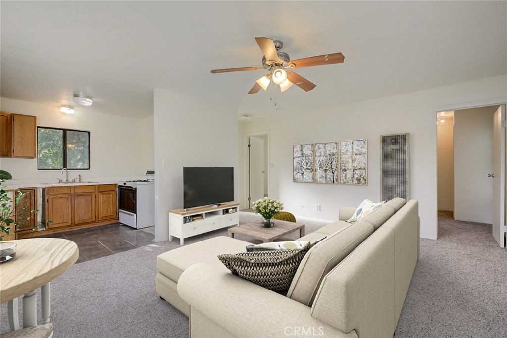 234 North Martha Place Fullerton, CA 92833 - Photo 33 of 46 a living room with furniture and a flat screen tv
