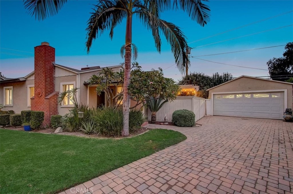 234 North Martha Place Fullerton, CA 92833 - Photo 4 of 46 a front view of a house with garden