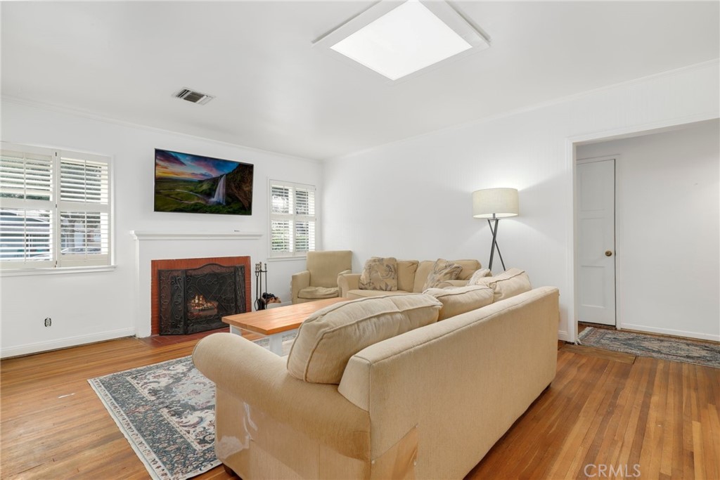 234 North Martha Place Fullerton, CA 92833 - Photo 7 of 46 a living room with furniture fireplace and flat screen tv