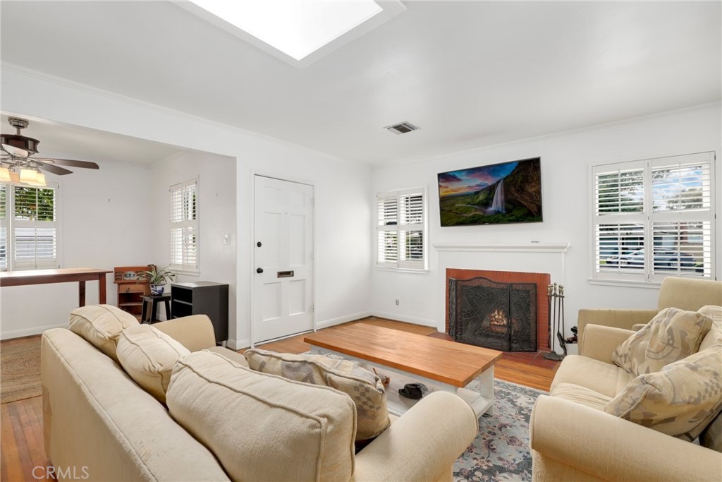 234 North Martha Place Fullerton, CA 92833 - Photo 8 of 46 a bedroom with furniture and a fireplace