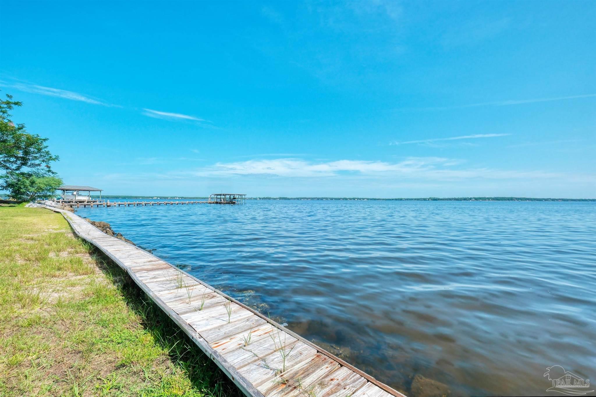 5450 North Shore Road Pensacola, FL 32507 - Photo 12 of 62 a view of ocean from a balcony