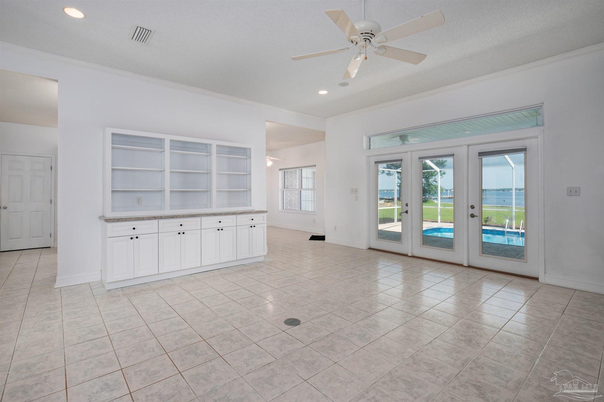5450 North Shore Road Pensacola, FL 32507 - Photo 14 of 62 a view of an empty room with a window