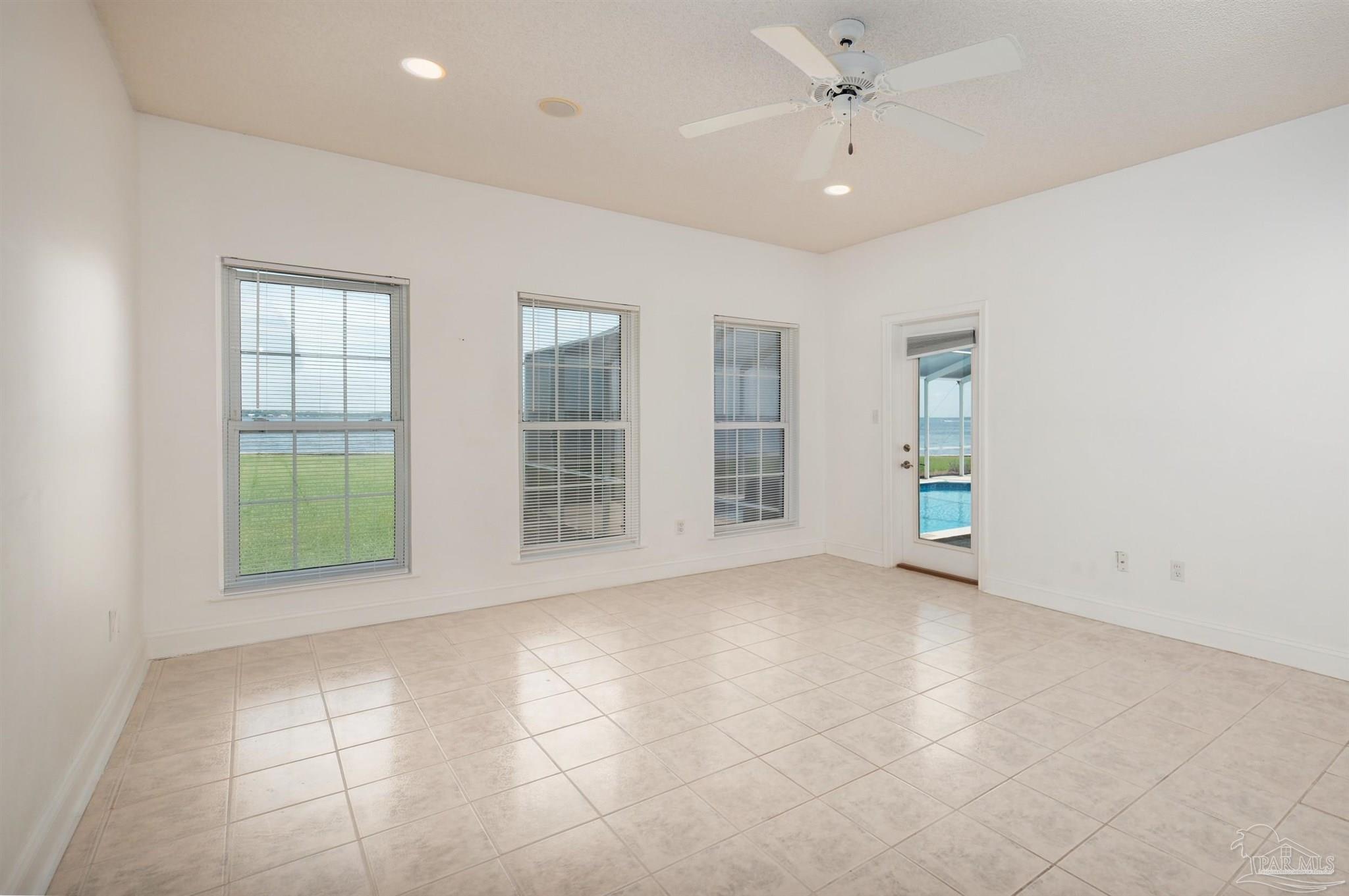 5450 North Shore Road Pensacola, FL 32507 - Photo 34 of 62 a view of an empty room with a window