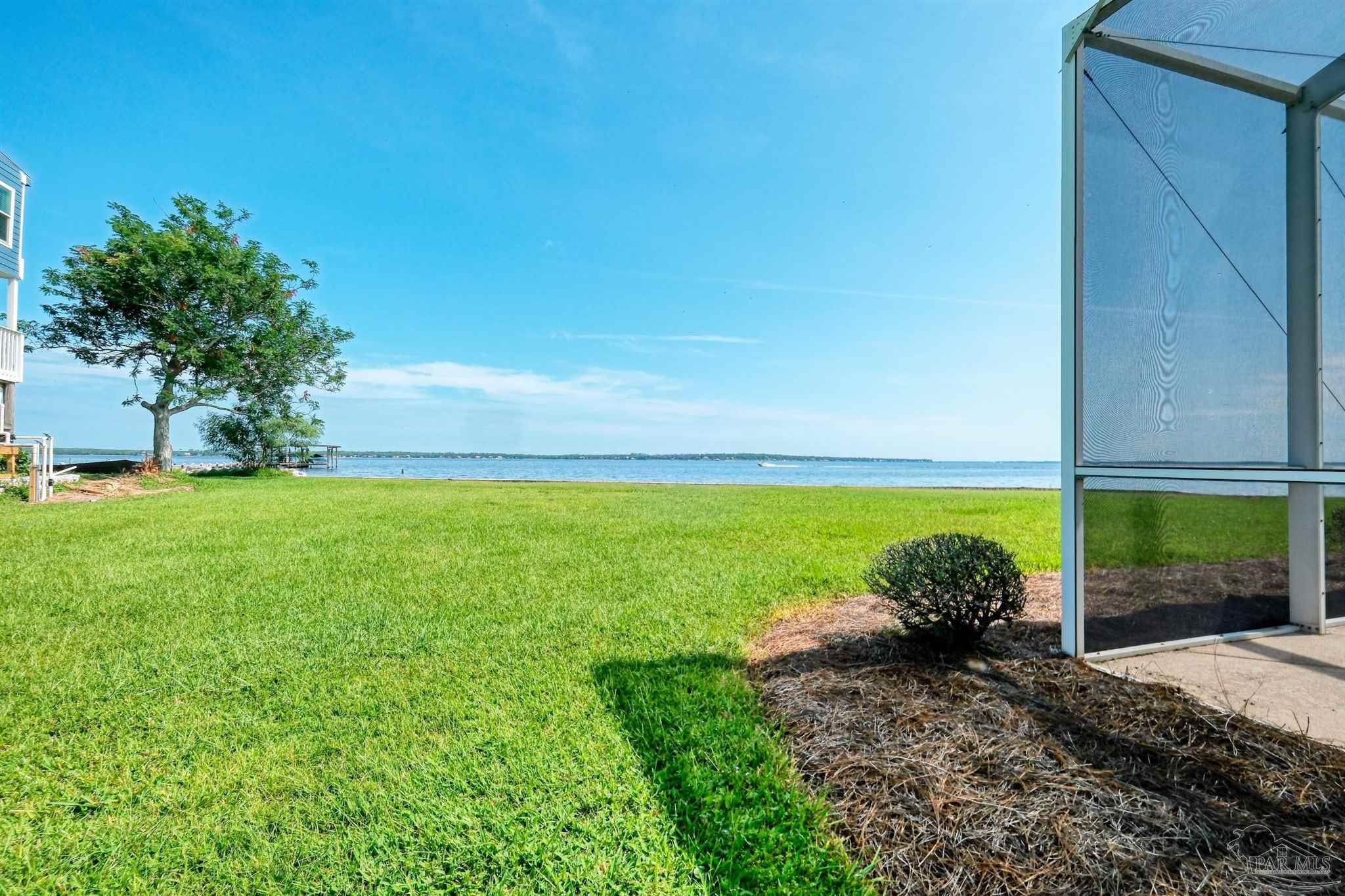 5450 North Shore Road Pensacola, FL 32507 - Photo 48 of 62 a view of a yard with an outdoor space