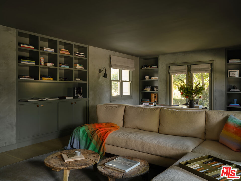 17333 Rancho Street Encino, CA 91316 - Photo 12 of 30 a living room with furniture and a window