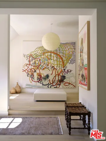 a view of wooden floor in a living room
