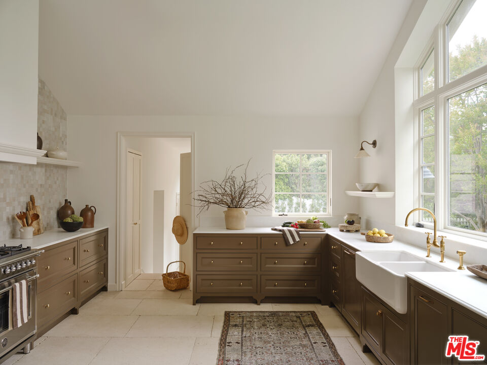 17333 Rancho Street Encino, CA 91316 - Photo 7 of 30 a room with a balcony a bed and furniture