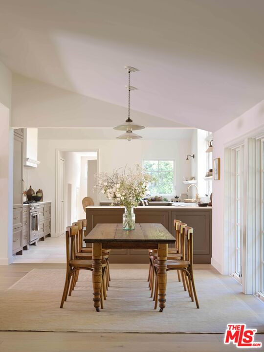 17333 Rancho Street Encino, CA 91316 - Photo 10 of 30 a view of a dining room with furniture
