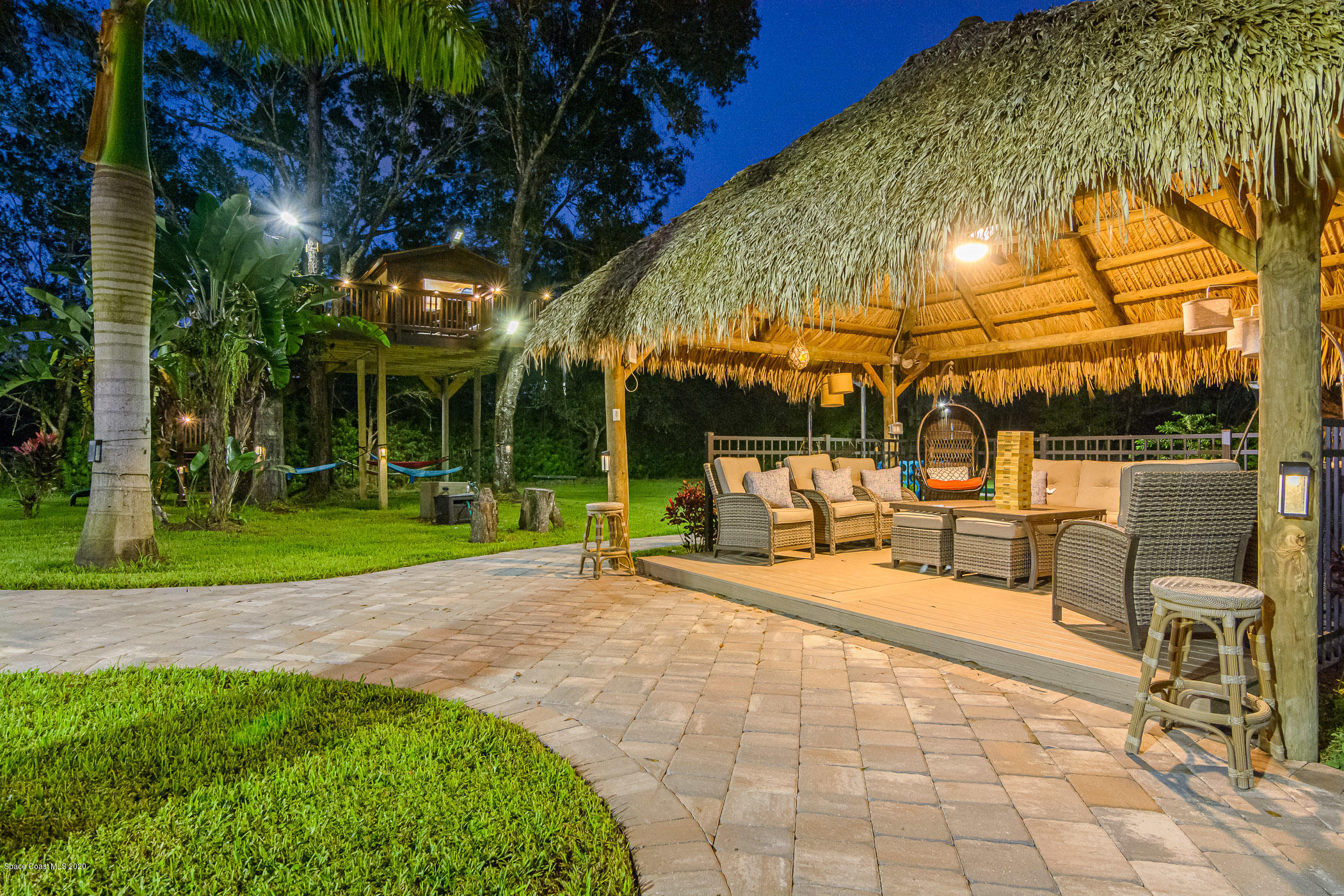 4085 Lake Washington Road Melbourne, FL 32934 - Photo 14 of 80 tiki hut at night