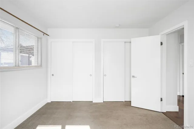 a bathroom with a sink a mirror and shower