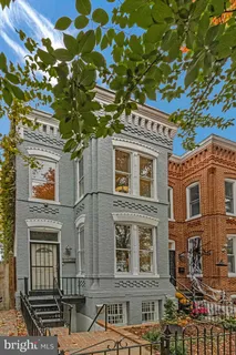 a front view of a multi story residential apartment building