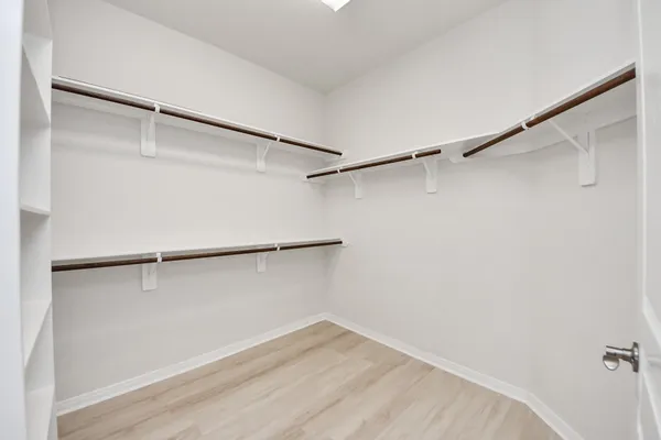 a front view of a house with a yard table and chairs
