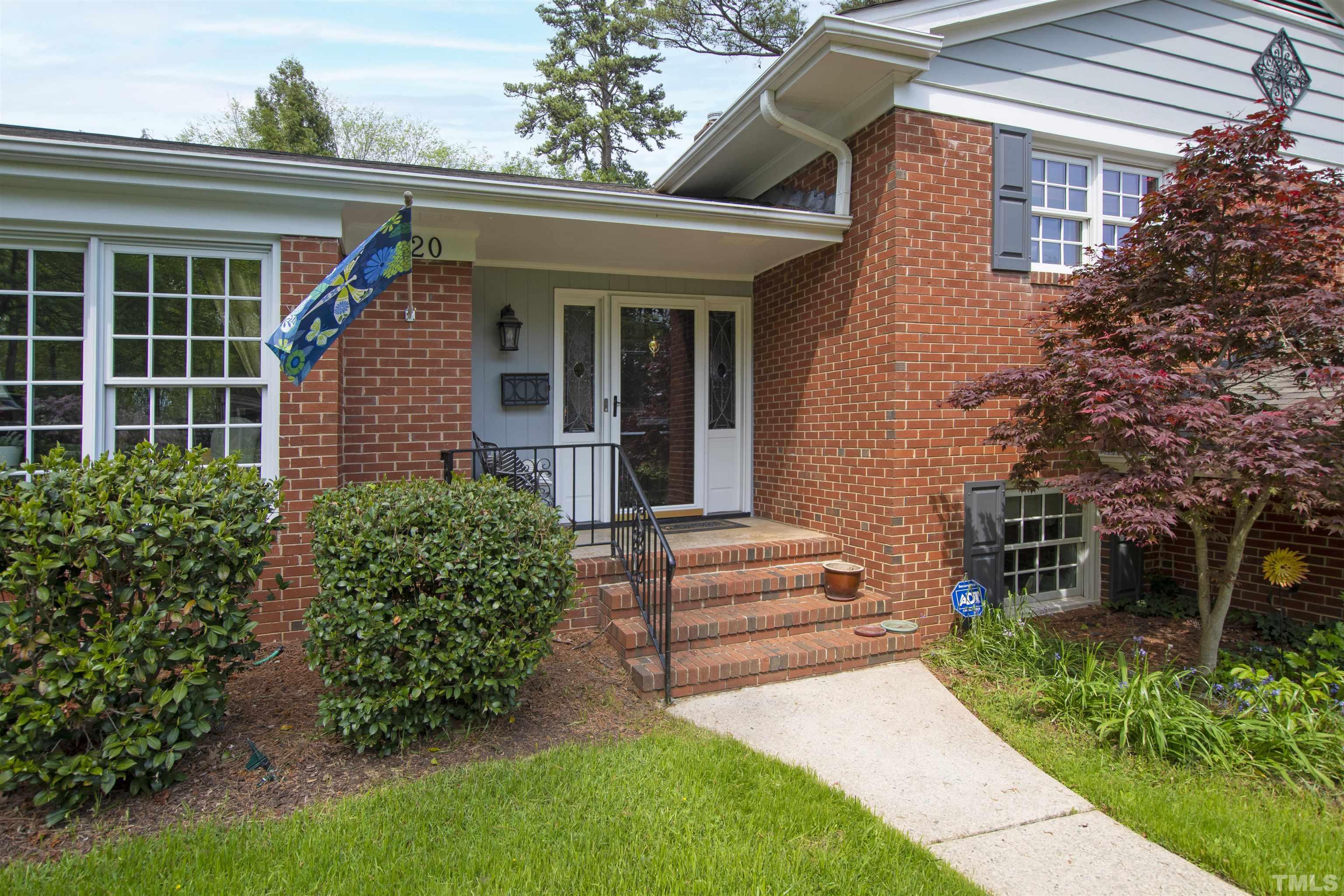 1320 Diehl Street Raleigh, NC 27608 - Photo 3 of 47 a view of a house with a yard and plants