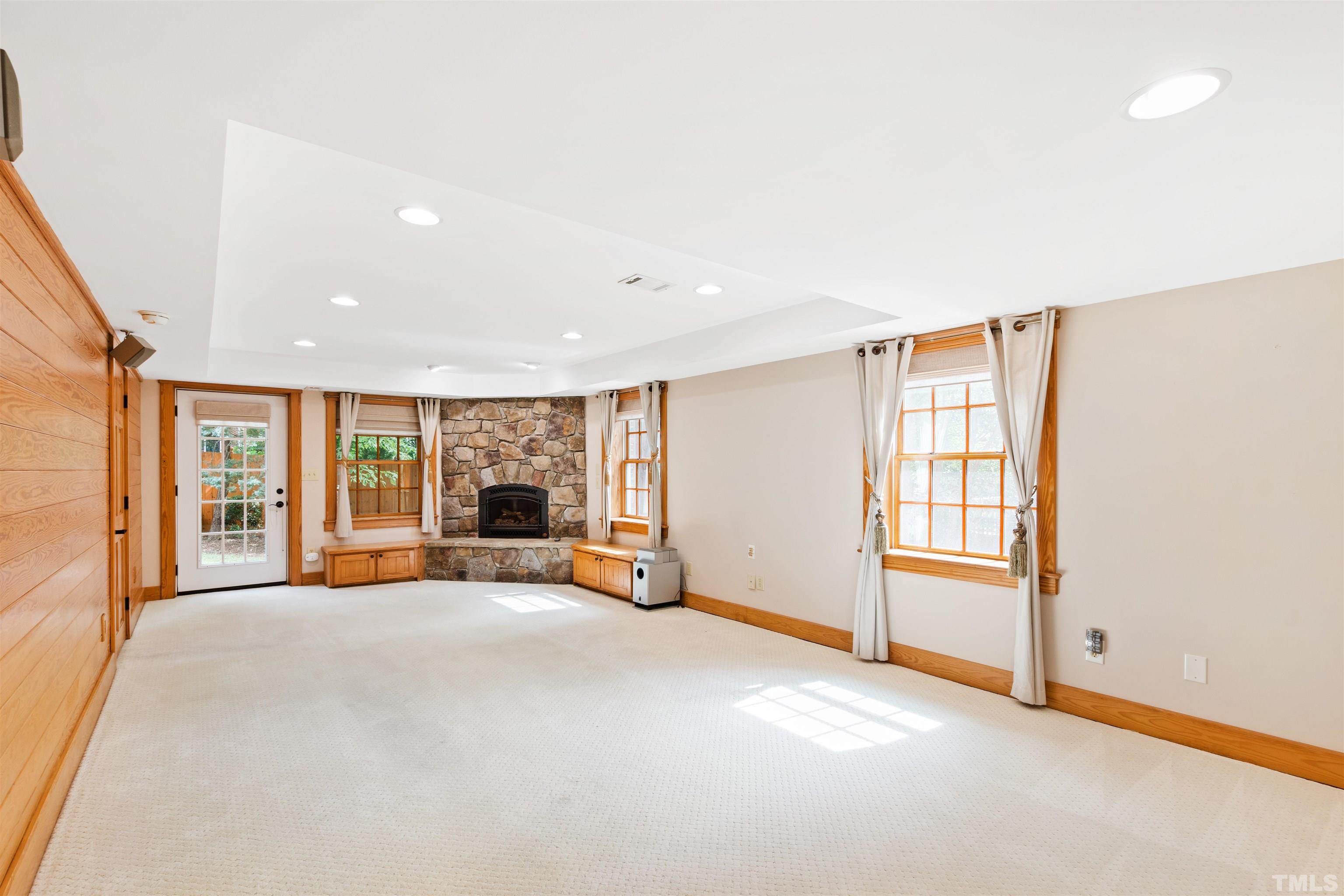 1320 Diehl Street Raleigh, NC 27608 - Photo 35 of 47 an empty room with furniture and large windows