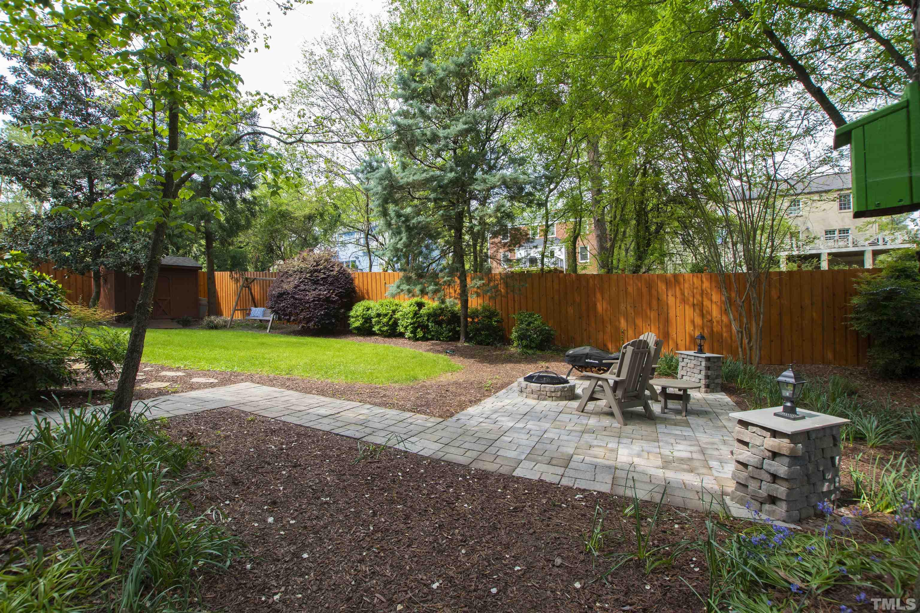 1320 Diehl Street Raleigh, NC 27608 - Photo 43 of 47 a view of backyard with outdoor seating and trees