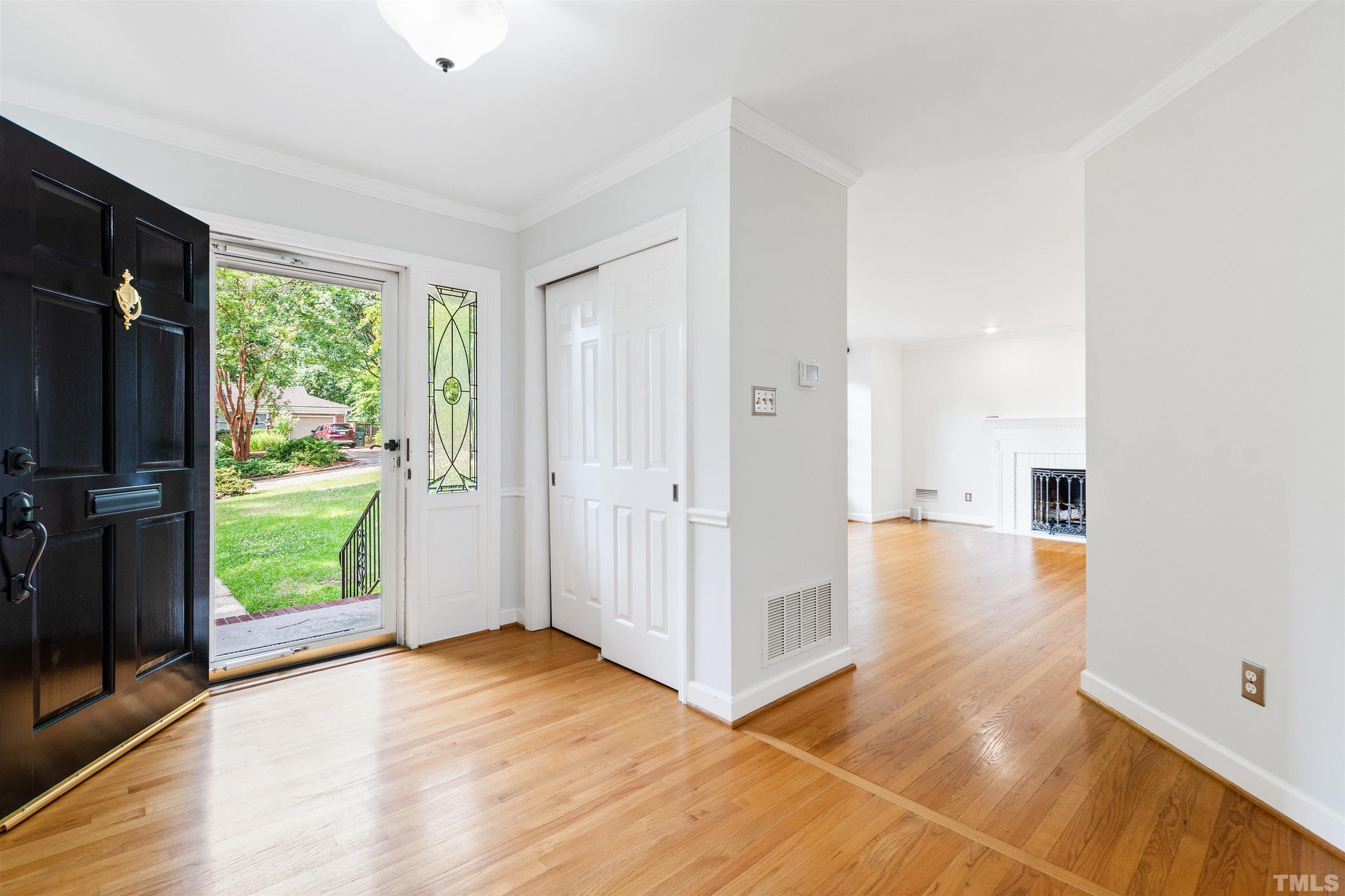 1320 Diehl Street Raleigh, NC 27608 - Photo 6 of 47 wooden floor in an empty room with a window