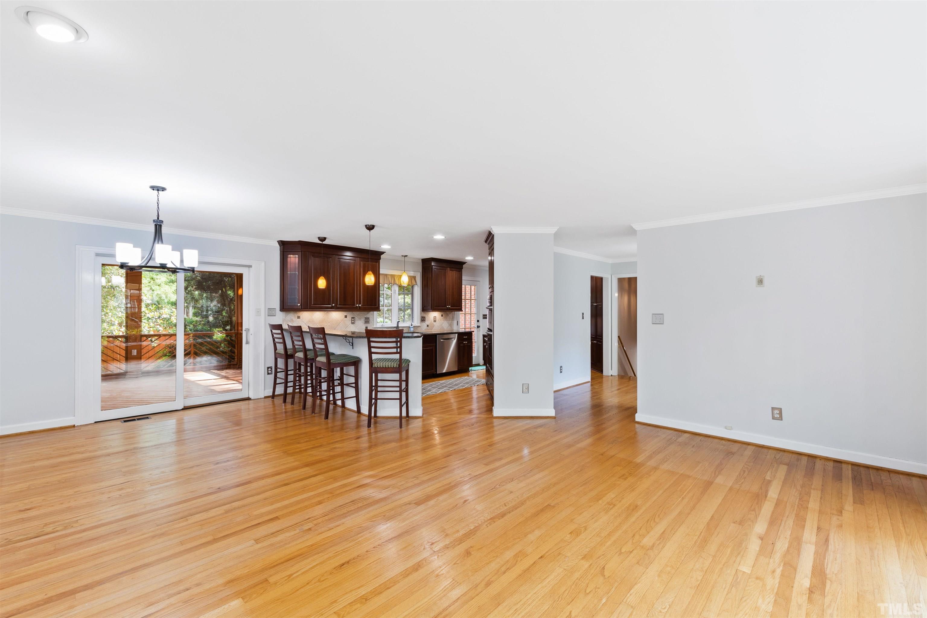 1320 Diehl Street Raleigh, NC 27608 - Photo 9 of 47 a view of kitchen with furniture and wooden floor