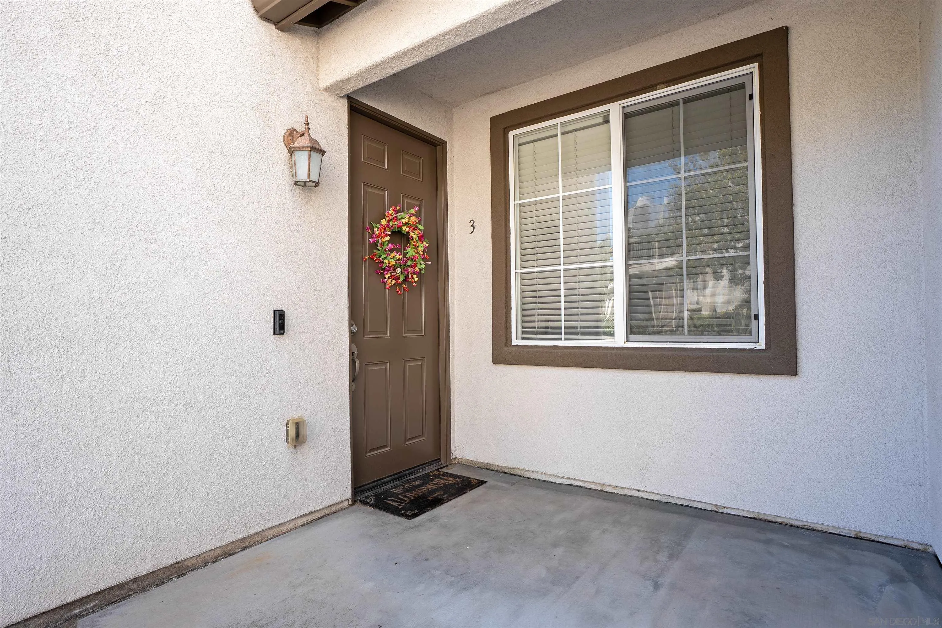 289 Reef Point Way, Unit 3 Oceanside, CA 92058 - Photo 2 of 23 an empty room with a window