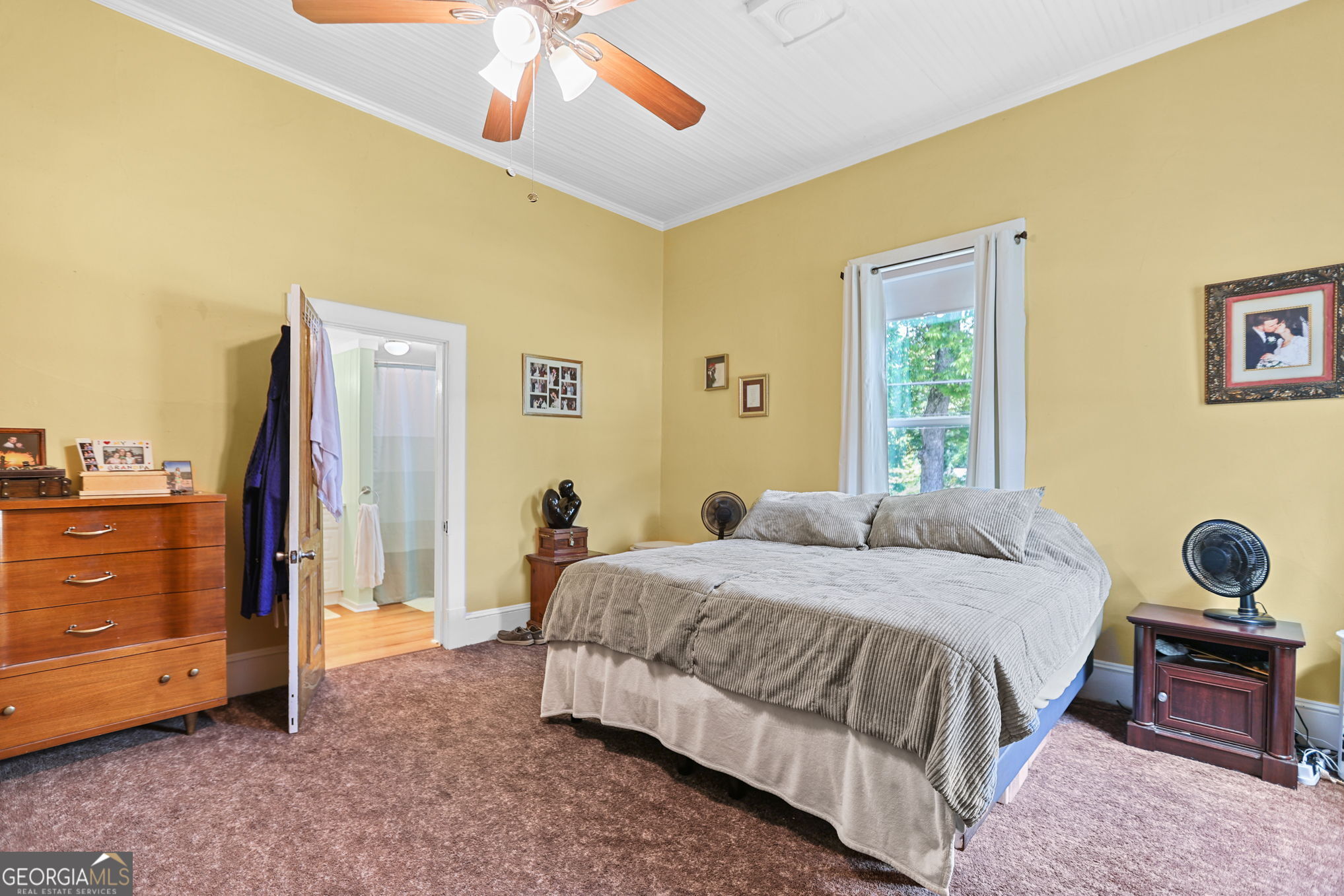 1205 Terrell Street Greenville, GA 30222 - Photo 14 of 50 a bedroom with a bed and a walk in closet