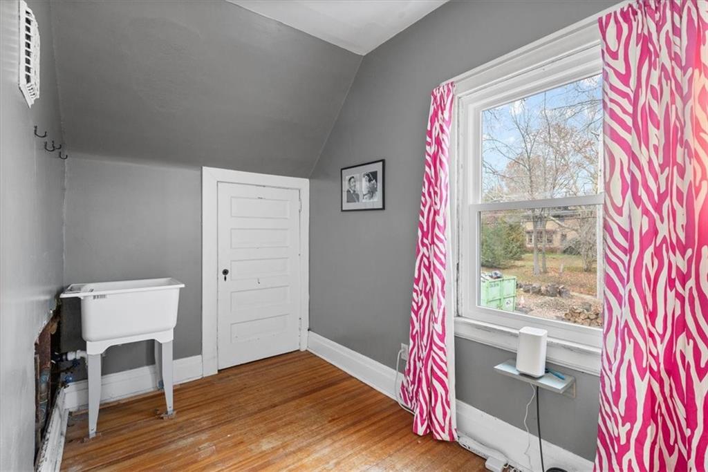 435 Dutch Ridge Road Beaver, PA 15009 - Photo 22 of 38 a room that has a bed and a chair in it