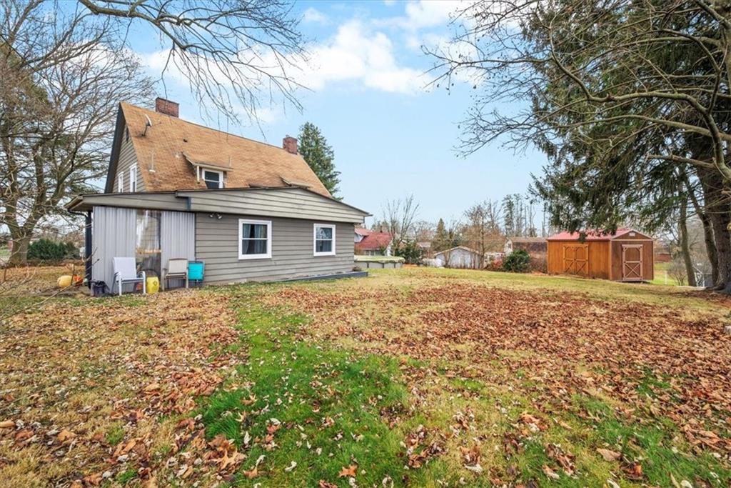 435 Dutch Ridge Road Beaver, PA 15009 - Photo 27 of 38 a view of house with backyard and tree