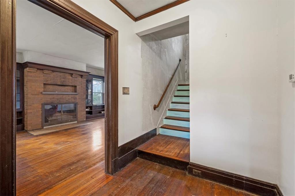 435 Dutch Ridge Road Beaver, PA 15009 - Photo 4 of 38 a view of a livingroom with wooden floor and staircase