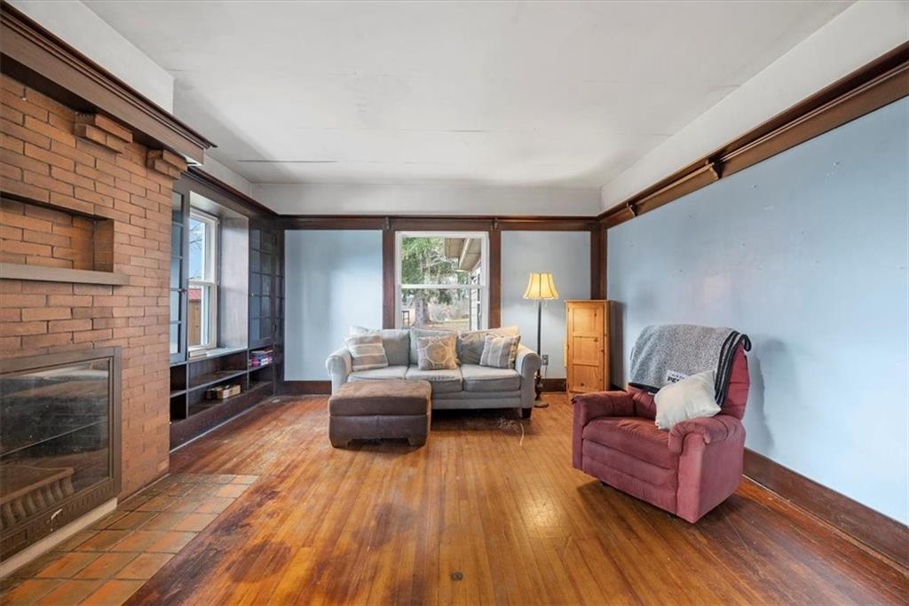 435 Dutch Ridge Road Beaver, PA 15009 - Photo 6 of 38 a living room with furniture and a fireplace